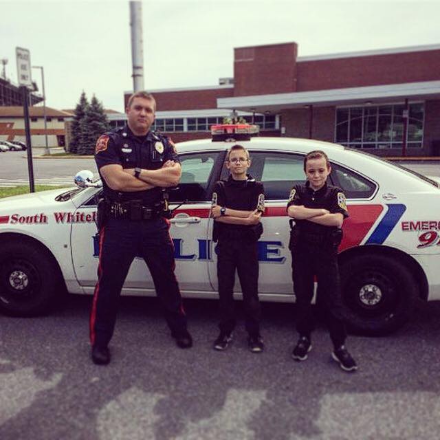 SRO Faust with two students dressed like police officers