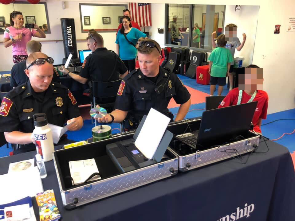 Officers using EZ Child ID System